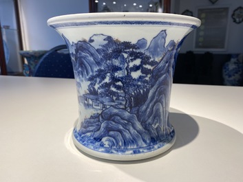 A fine Chinese blue, white and copper red 'Master of the Rocks' brush pot, Kangxi